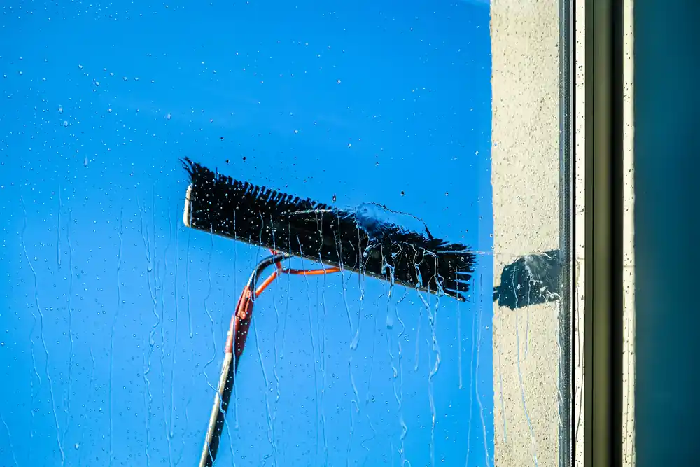 Exterior window cleaning with water-fed pole